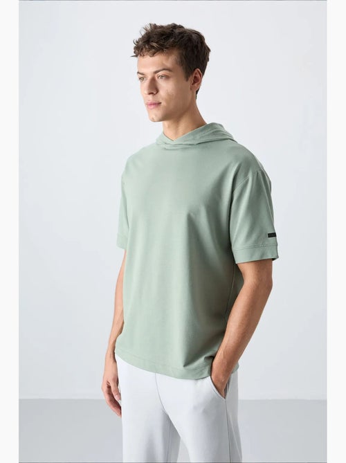 T-shirt oversize con cappuccio e maniche corte tommy - Kiabi T-shirt oversize con cappuccio e maniche corte tommy - Kiabi