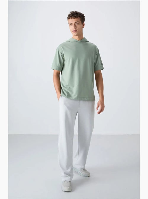 T-shirt oversize con cappuccio e maniche corte tommy - Kiabi T-shirt oversize con cappuccio e maniche corte tommy - Kiabi