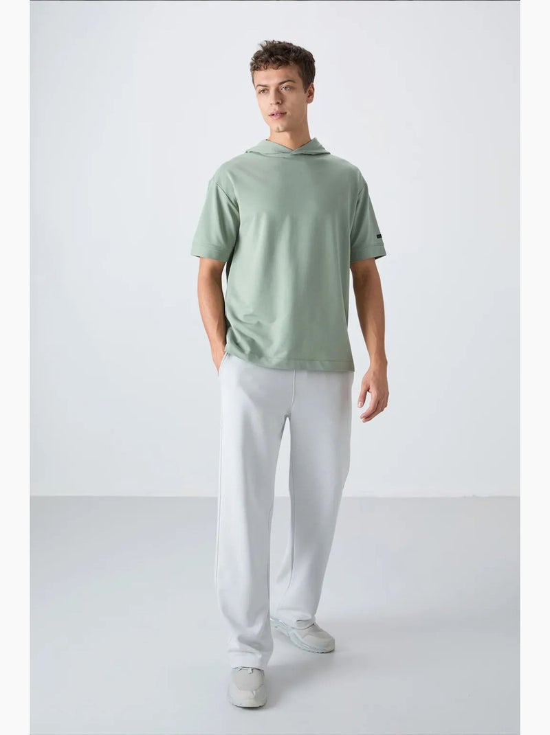 T-shirt oversize con cappuccio e maniche corte tommy Verde menta - Kiabi