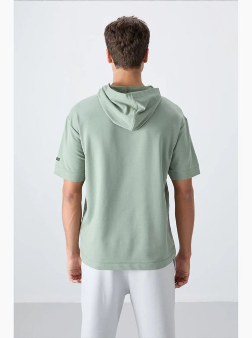 T-shirt oversize con cappuccio e maniche corte tommy - Kiabi T-shirt oversize con cappuccio e maniche corte tommy - Kiabi