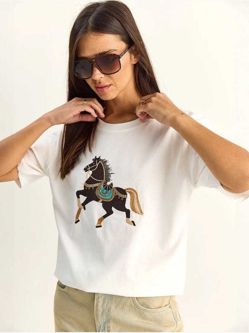 T-shirt oversize con ricamo e paillettes, girocollo lucci Bianco - Kiabi
