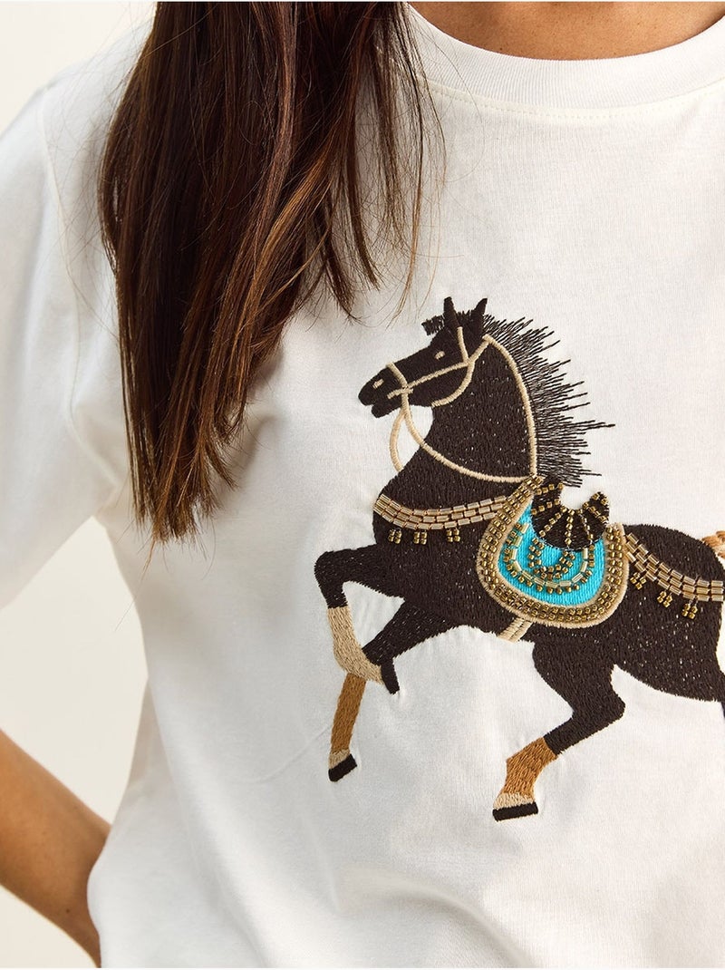 T-shirt oversize con ricamo e paillettes, girocollo lucci Bianco - Kiabi