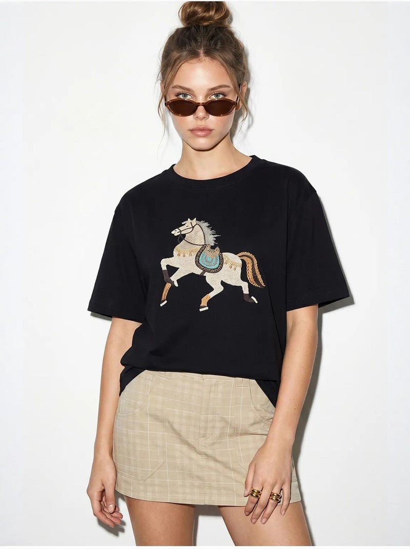 T-shirt oversize con ricamo e paillettes, girocollo lucci Nero - Kiabi
