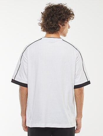 T-shirt oversize con riga