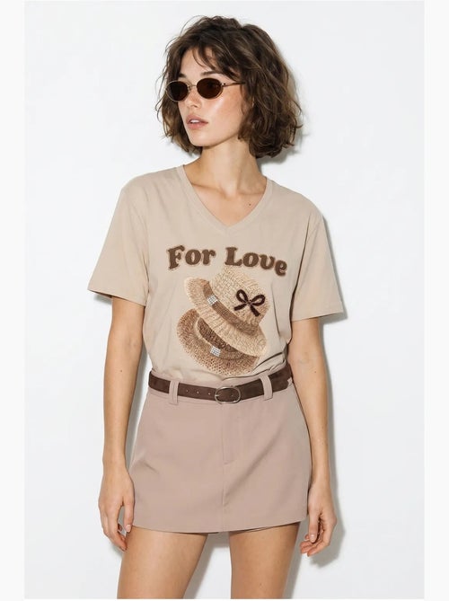 T-shirt oversize con scollo a v e stampa lucci - Kiabi T-shirt oversize con scollo a v e stampa lucci - Kiabi