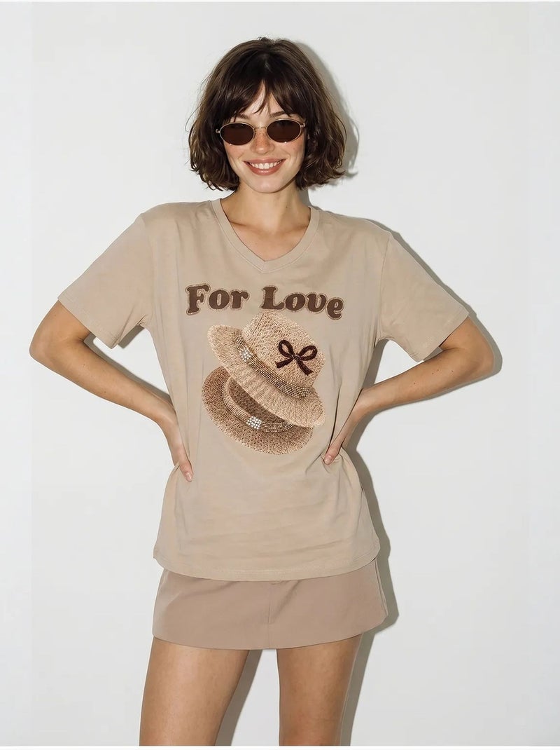 T-shirt oversize con scollo a v e stampa lucci Beige argilla - Kiabi
