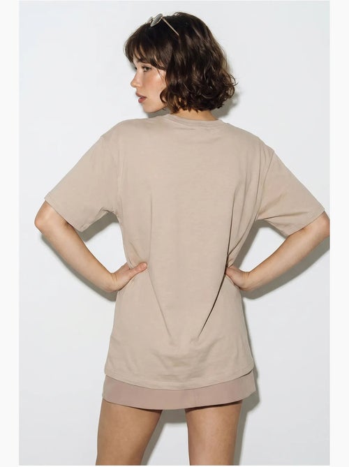 T-shirt oversize con scollo a v e stampa lucci - Kiabi T-shirt oversize con scollo a v e stampa lucci - Kiabi