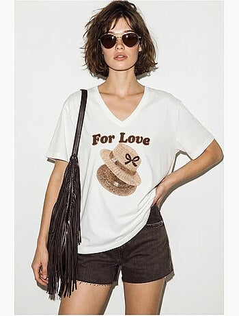 T-shirt oversize con scollo a v e stampa lucci