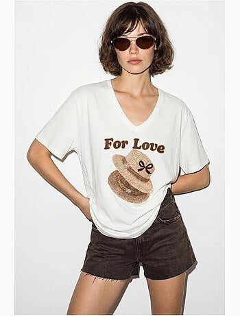 T-shirt oversize con scollo a v e stampa lucci
