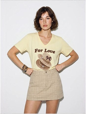 T-shirt oversize con scollo a v e stampa lucci