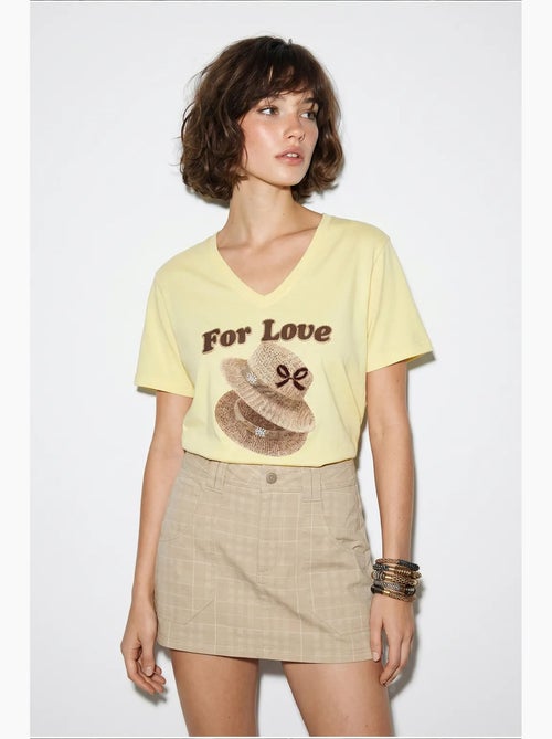 T-shirt oversize con scollo a v e stampa lucci - Kiabi T-shirt oversize con scollo a v e stampa lucci - Kiabi