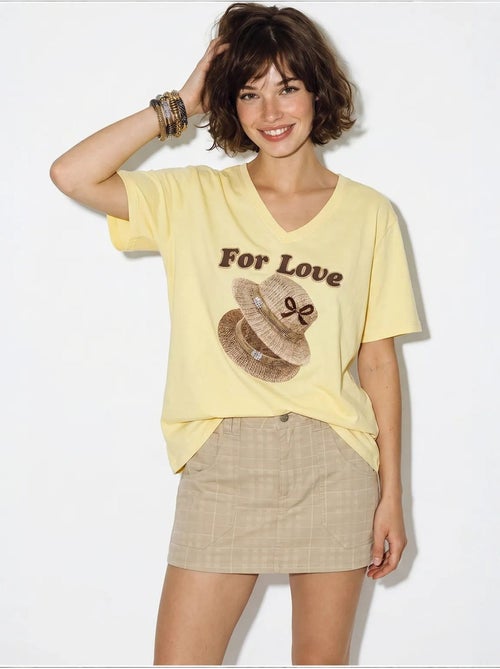 T-shirt oversize con scollo a v e stampa lucci - Kiabi T-shirt oversize con scollo a v e stampa lucci - Kiabi