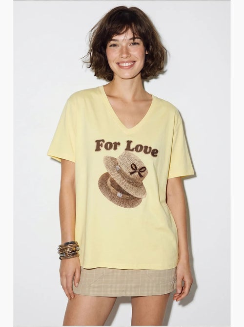 T-shirt oversize con scollo a v e stampa lucci - Kiabi T-shirt oversize con scollo a v e stampa lucci - Kiabi
