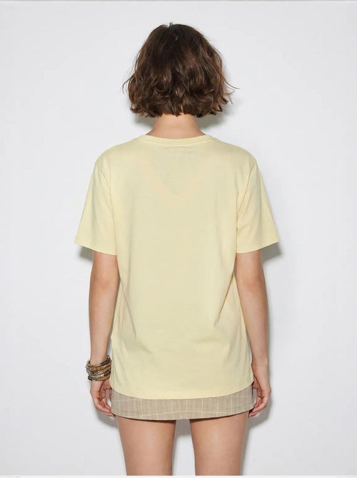 T-shirt oversize con scollo a v e stampa lucci - Kiabi T-shirt oversize con scollo a v e stampa lucci - Kiabi