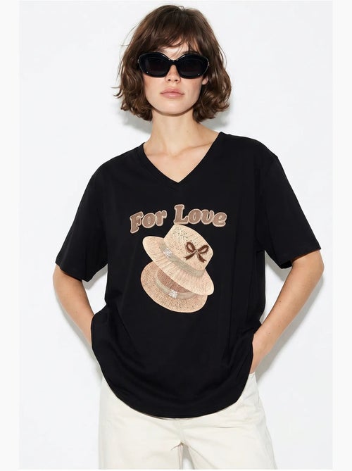 T-shirt oversize con scollo a v e stampa lucci - Kiabi T-shirt oversize con scollo a v e stampa lucci - Kiabi
