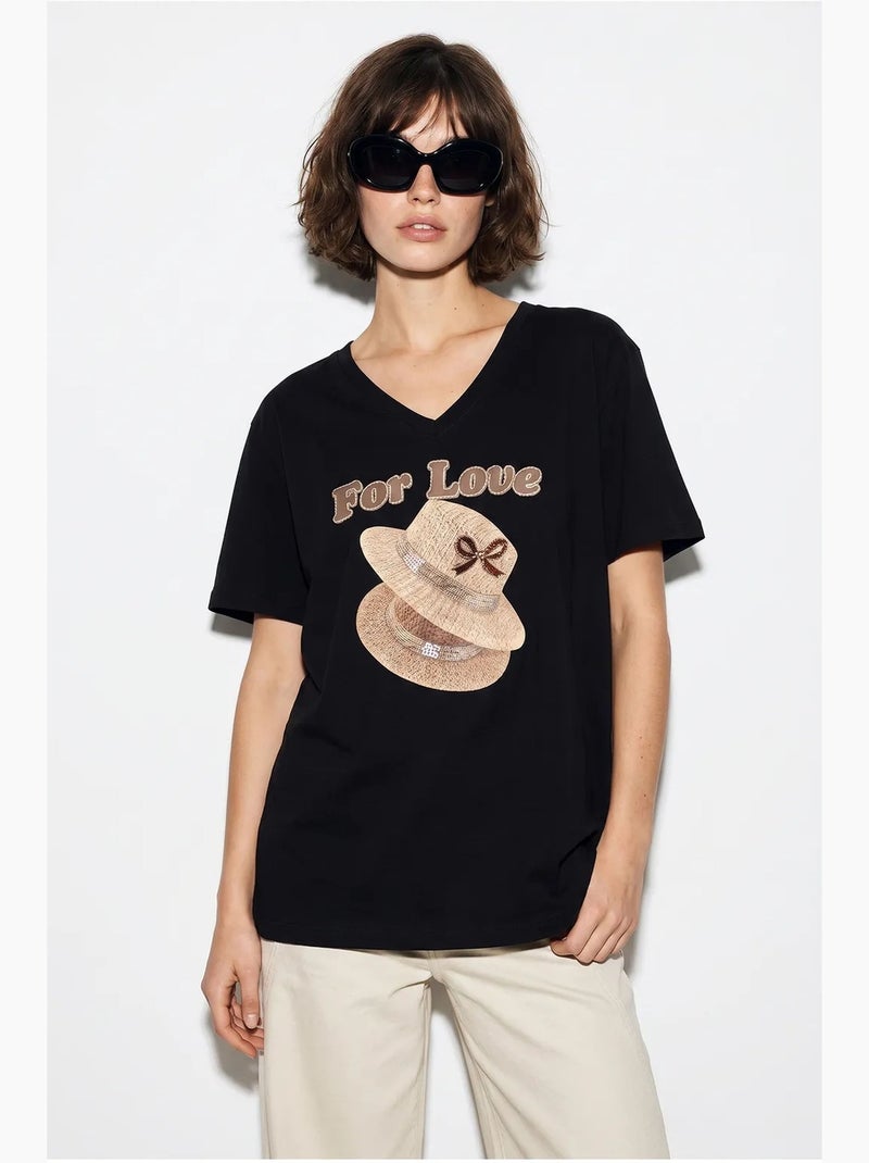 T-shirt oversize con scollo a v e stampa lucci Nero - Kiabi