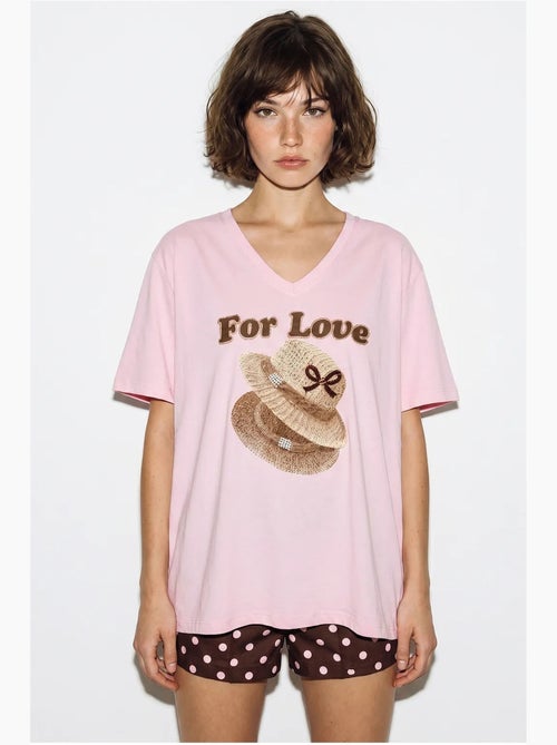 T-shirt oversize con scollo a v e stampa lucci - Kiabi T-shirt oversize con scollo a v e stampa lucci - Kiabi