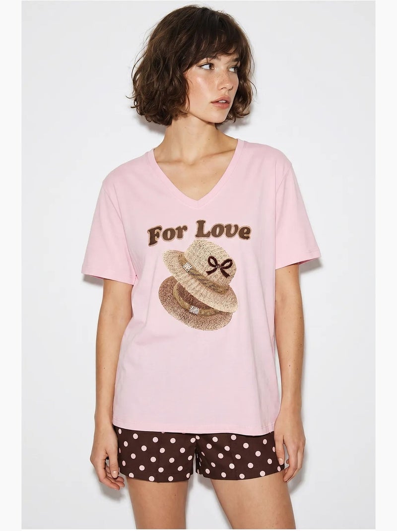 T-shirt oversize con scollo a v e stampa lucci Rosa chiaro - Kiabi
