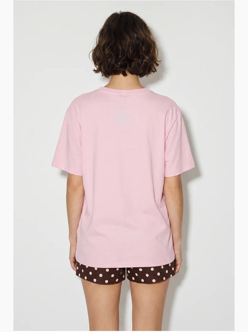 T-shirt oversize con scollo a v e stampa lucci Rosa chiaro - Kiabi