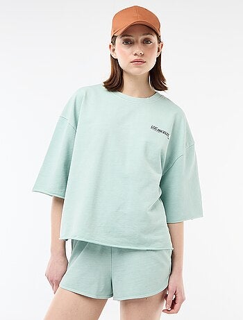 T-shirt oversize con scritta