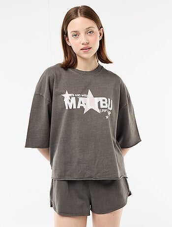 T-shirt oversize con scritta