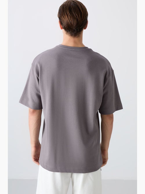 T-shirt oversize con stampa e girocollo tommy - Kiabi