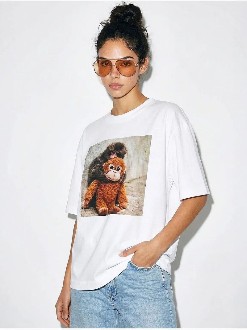 T-shirt oversize con stampa e scollo a girocollo con dettaglio accessorio lucci Bianco - Kiabi