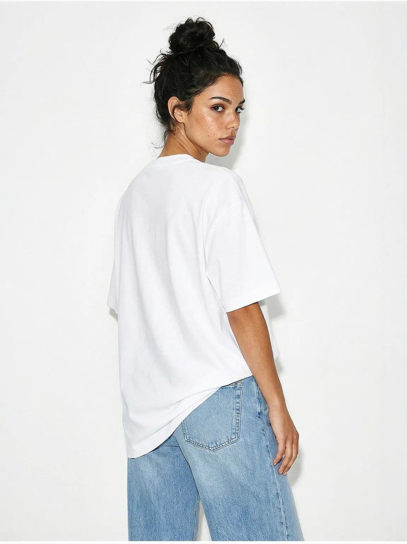 T-shirt oversize con stampa e scollo a girocollo con dettaglio accessorio lucci Bianco - Kiabi