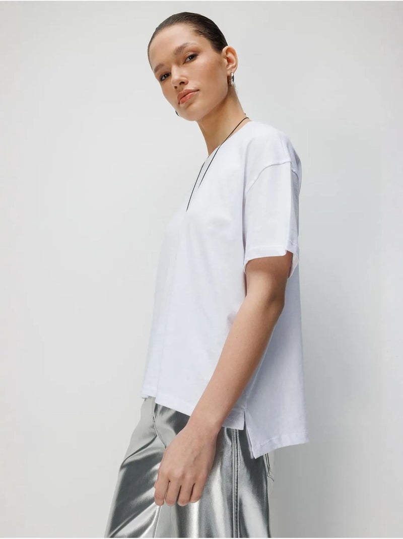 T-shirt oversize girocollo tinta unita con spacchi mixray Bianco - Kiabi