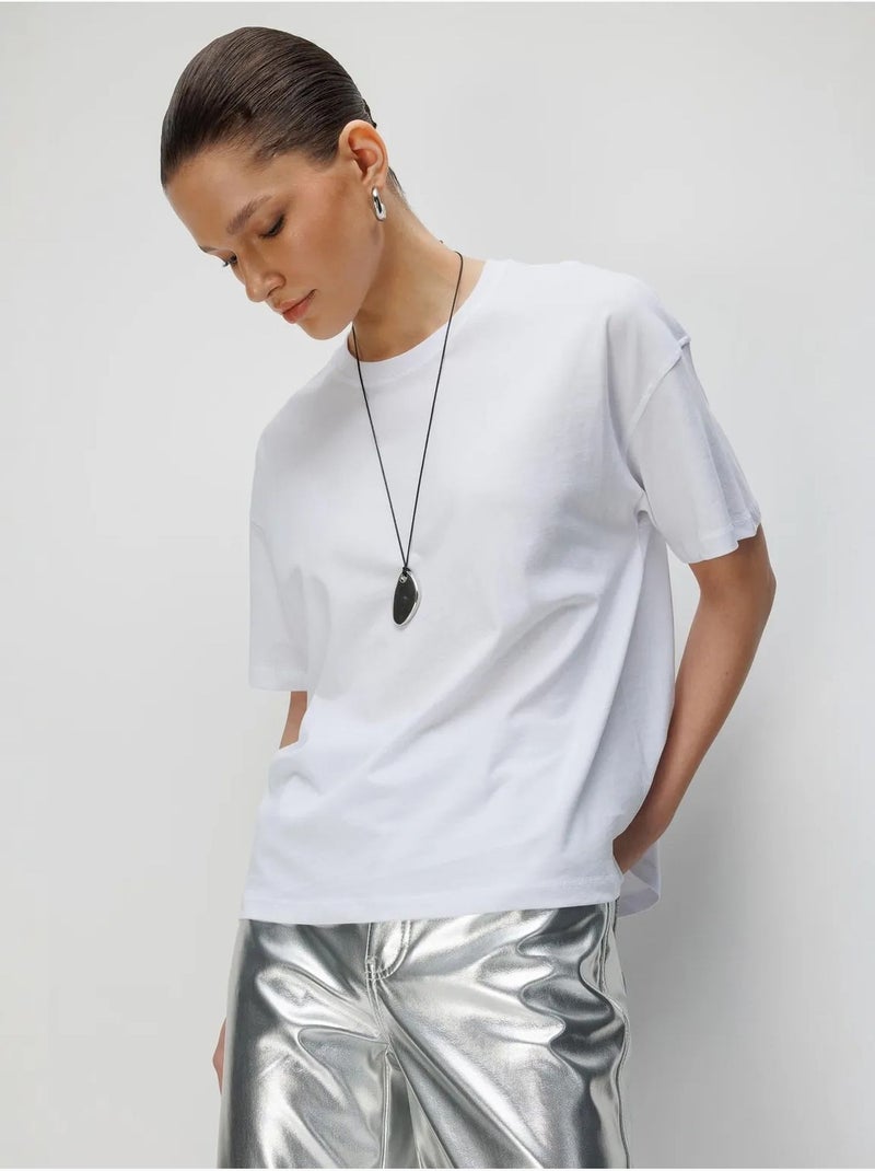 T-shirt oversize girocollo tinta unita con spacchi mixray Bianco - Kiabi