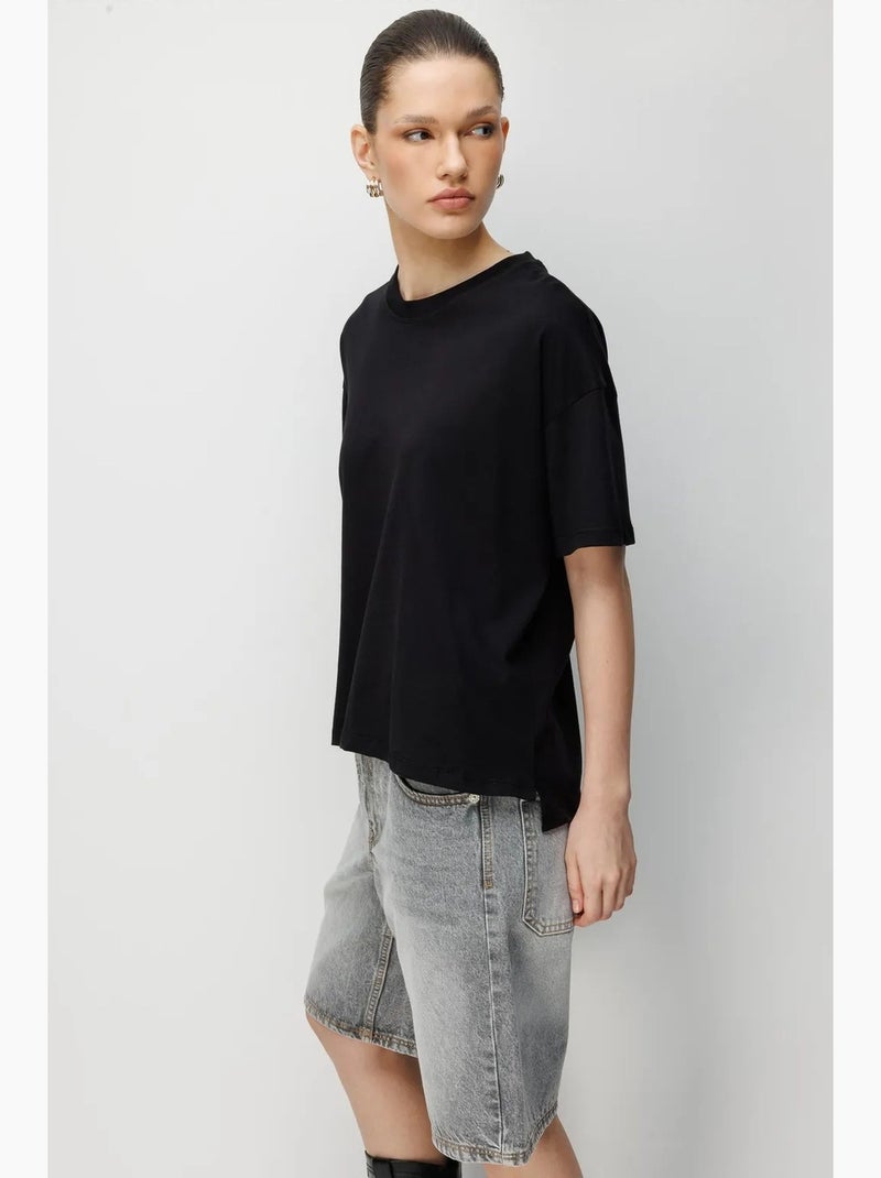 T-shirt oversize girocollo tinta unita con spacchi mixray Nero - Kiabi