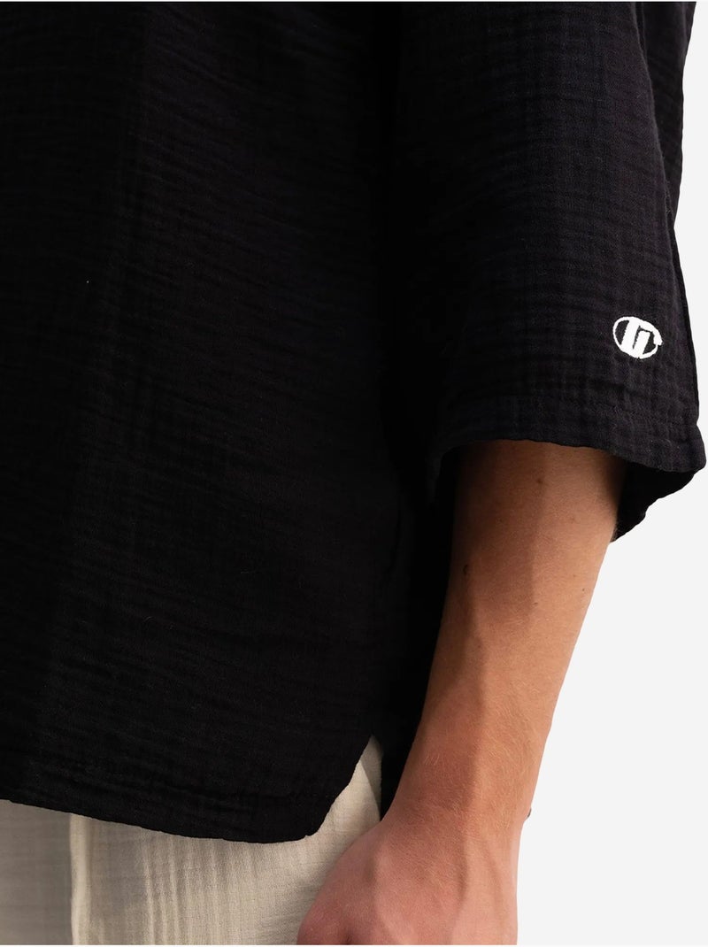 T-shirt oversize in cotone con girocollo giesto Nero - Kiabi