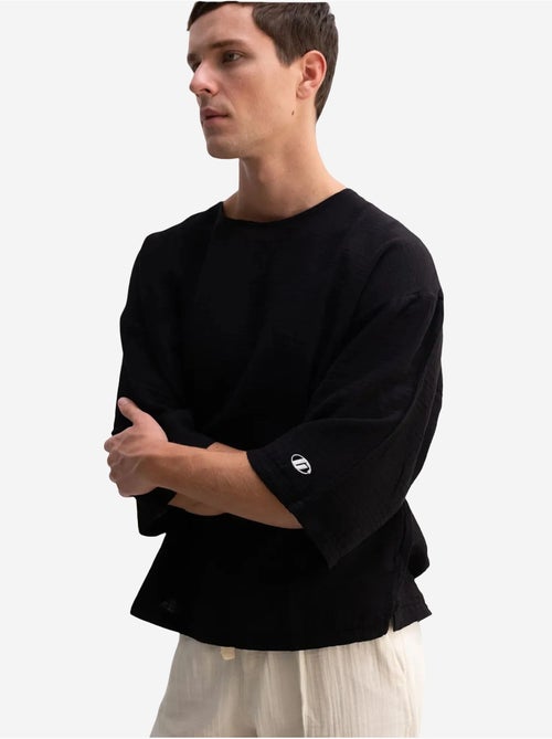 T-shirt oversize in cotone con girocollo giesto - Kiabi T-shirt oversize in cotone con girocollo giesto - Kiabi