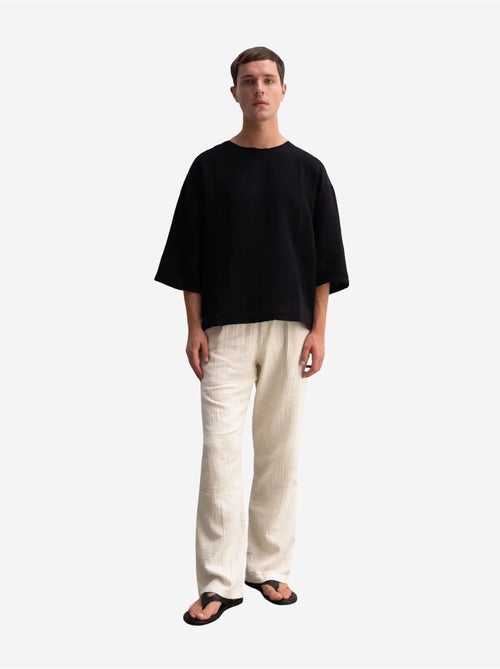 T-shirt oversize in cotone con girocollo giesto - Kiabi T-shirt oversize in cotone con girocollo giesto - Kiabi