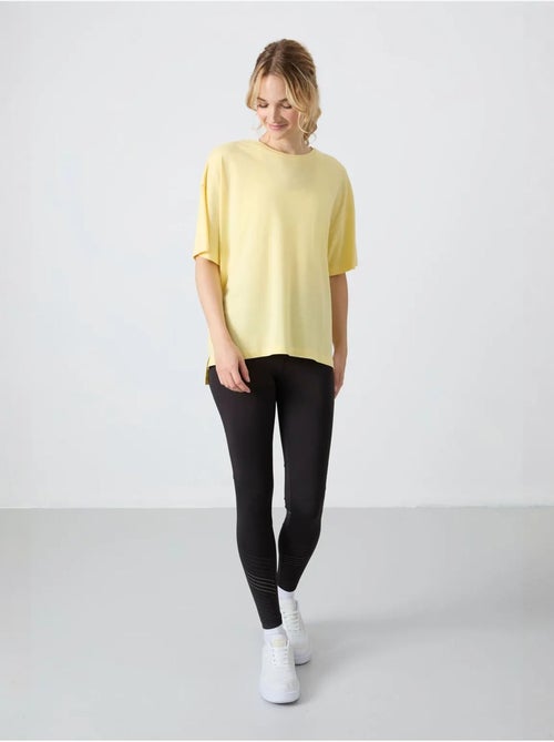 T-shirt oversize in cotone-modal con girocollo tommy - Kiabi T-shirt oversize in cotone-modal con girocollo tommy - Kiabi