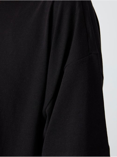 T-shirt oversize in cotone-modal con girocollo tommy - Kiabi T-shirt oversize in cotone-modal con girocollo tommy - Kiabi