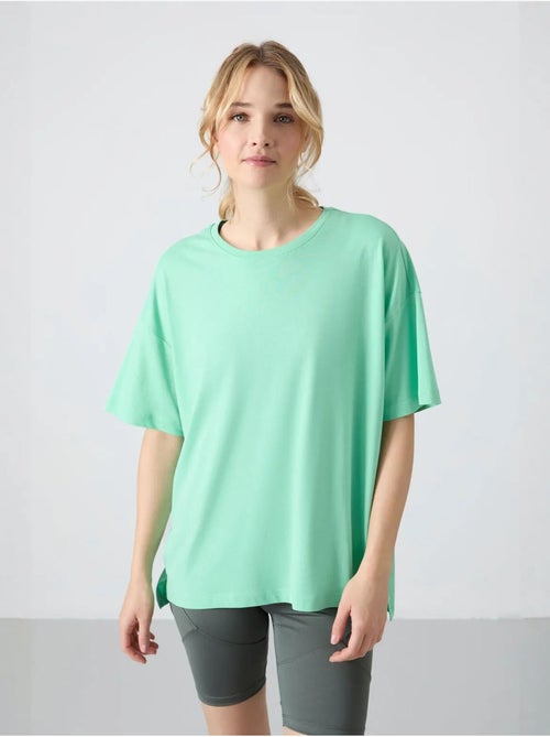 T-shirt oversize in cotone-modal con girocollo tommy - Kiabi T-shirt oversize in cotone-modal con girocollo tommy - Kiabi