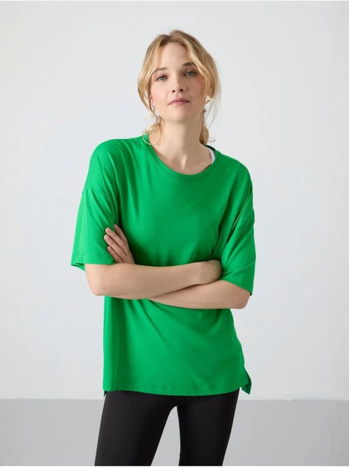T-shirt oversize in cotone-modal con girocollo tommy - Kiabi T-shirt oversize in cotone-modal con girocollo tommy - Kiabi