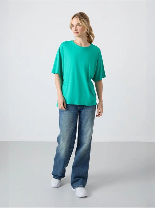 T-shirt oversize in cotone-modal con girocollo tommy - Kiabi T-shirt oversize in cotone-modal con girocollo tommy - Kiabi