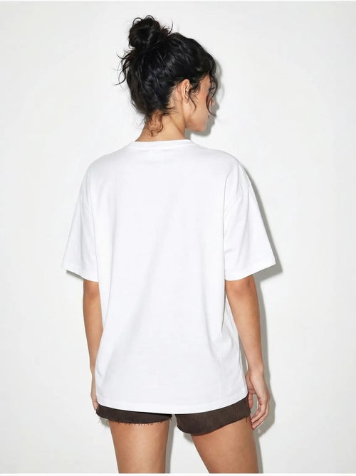 T-shirt oversize in jersey di cotone stampata lucci - Kiabi T-shirt oversize in jersey di cotone stampata lucci - Kiabi