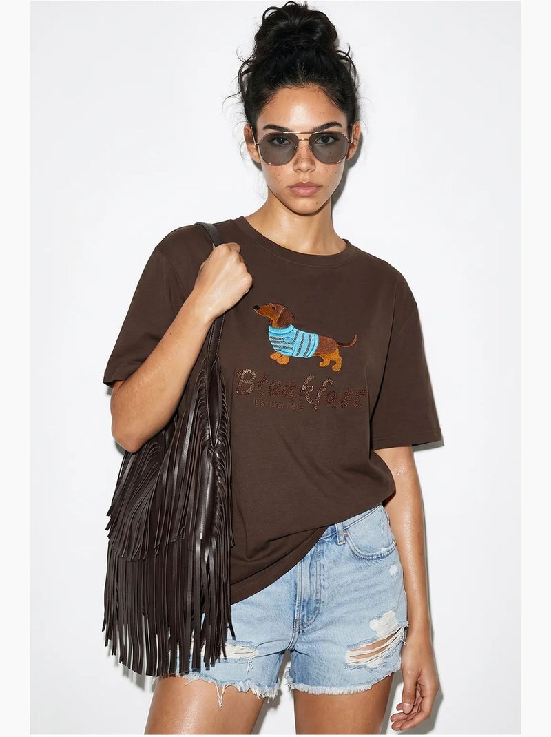 T-shirt oversize in jersey di cotone stampata lucci Marrone - Kiabi