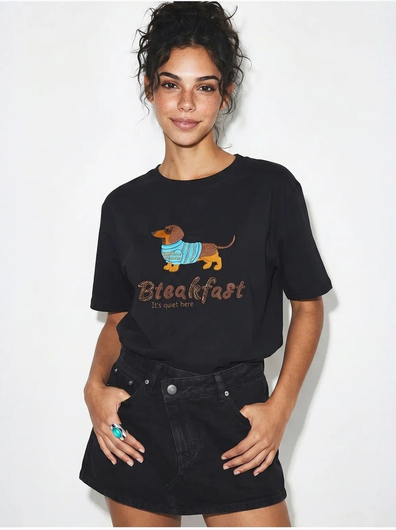 T-shirt oversize in jersey di cotone stampata lucci Nero - Kiabi