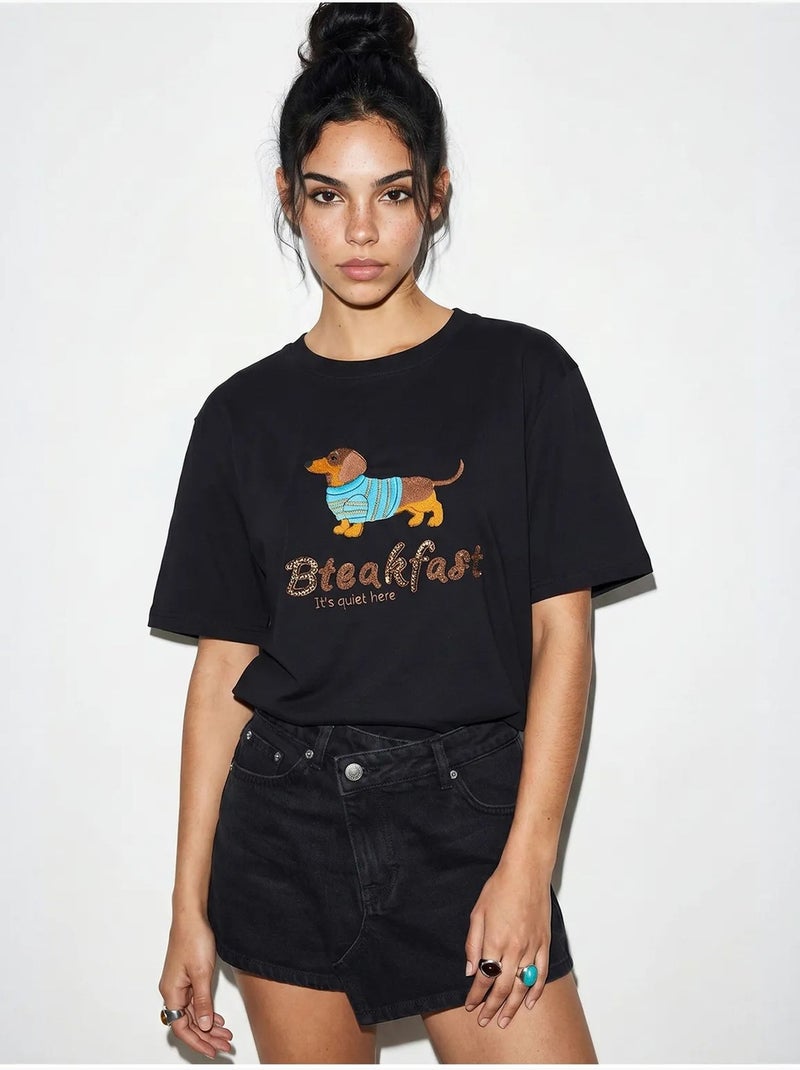 T-shirt oversize in jersey di cotone stampata lucci Nero - Kiabi