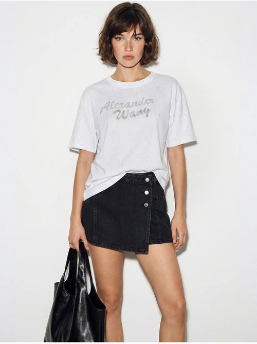 T-shirt oversize in jersey di cotone stampato lucci - Kiabi T-shirt oversize in jersey di cotone stampato lucci - Kiabi