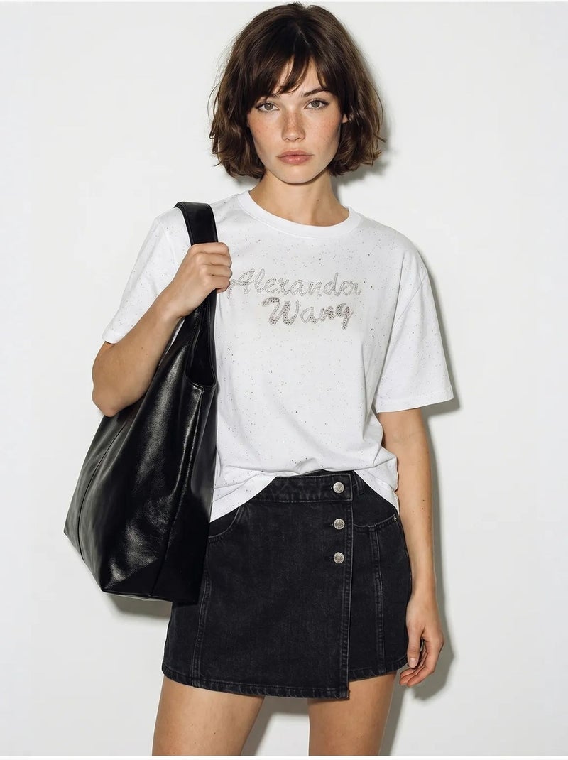 T-shirt oversize in jersey di cotone stampato lucci Bianco - Kiabi