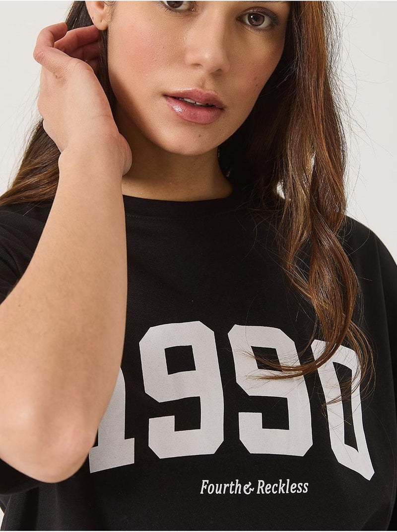 T-shirt oversize stampata con girocollo lucci Nero - Kiabi