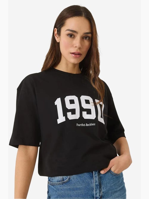 T-shirt oversize stampata con girocollo lucci - Kiabi T-shirt oversize stampata con girocollo lucci - Kiabi