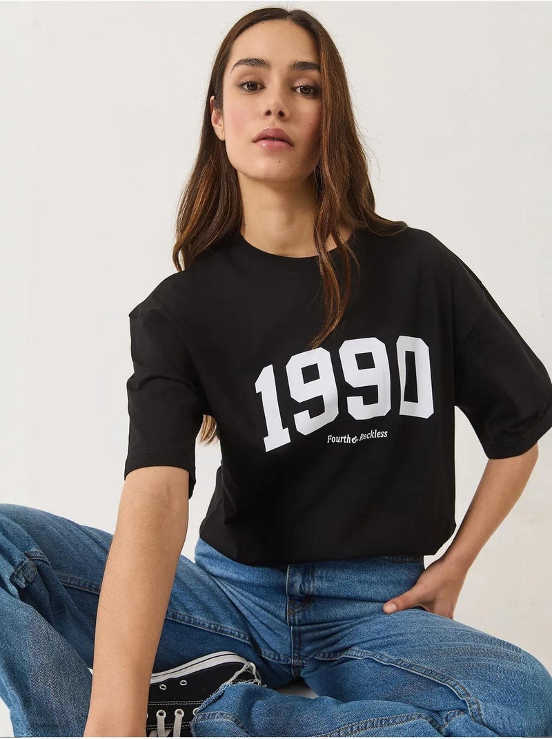 T-shirt oversize stampata con girocollo lucci Nero - Kiabi
