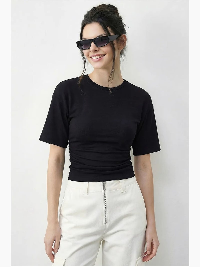 T-shirt regular fit con girocollo lucci Nero - Kiabi