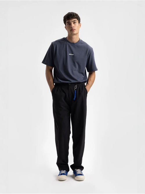T-shirt relaxed fit con stampa logo e girocollo giesto - Kiabi T-shirt relaxed fit con stampa logo e girocollo giesto - Kiabi